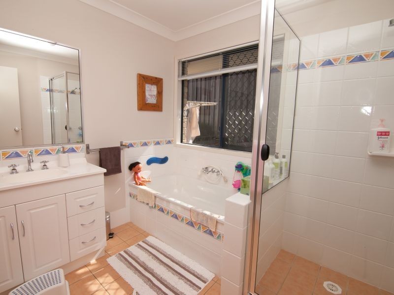 10 Palm Street, Pacific Pines QLD 4211