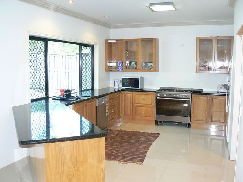 15 Sangster Crescent, Pacific Pines QLD 4211