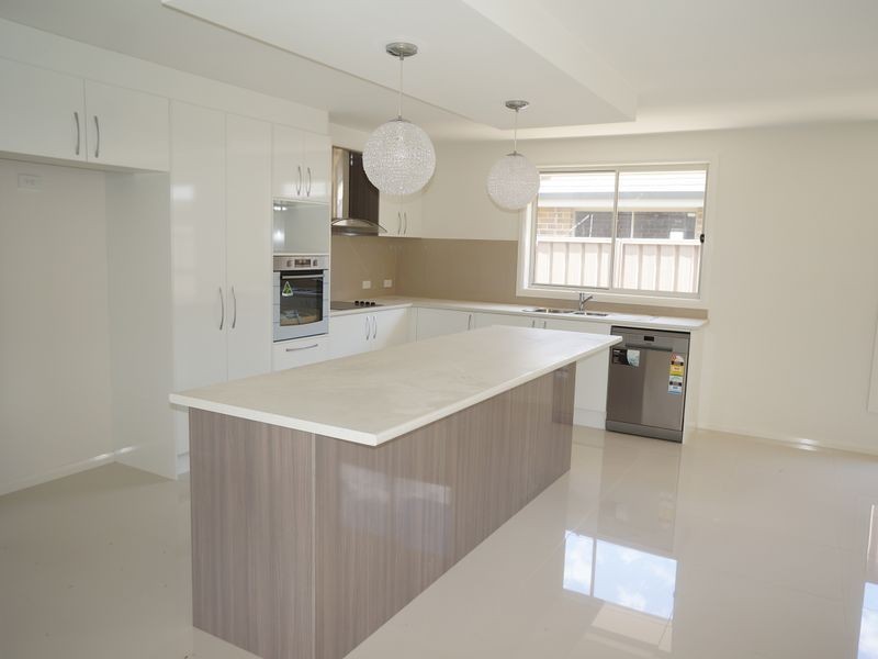 63 Albatross Way, Old Bar NSW 2430