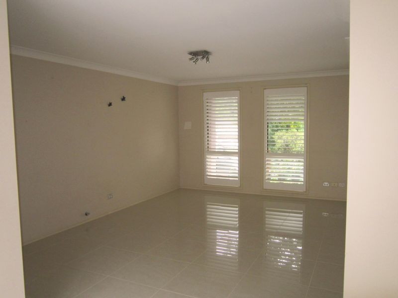 3 Wixstead Close, Point Clare NSW 2250