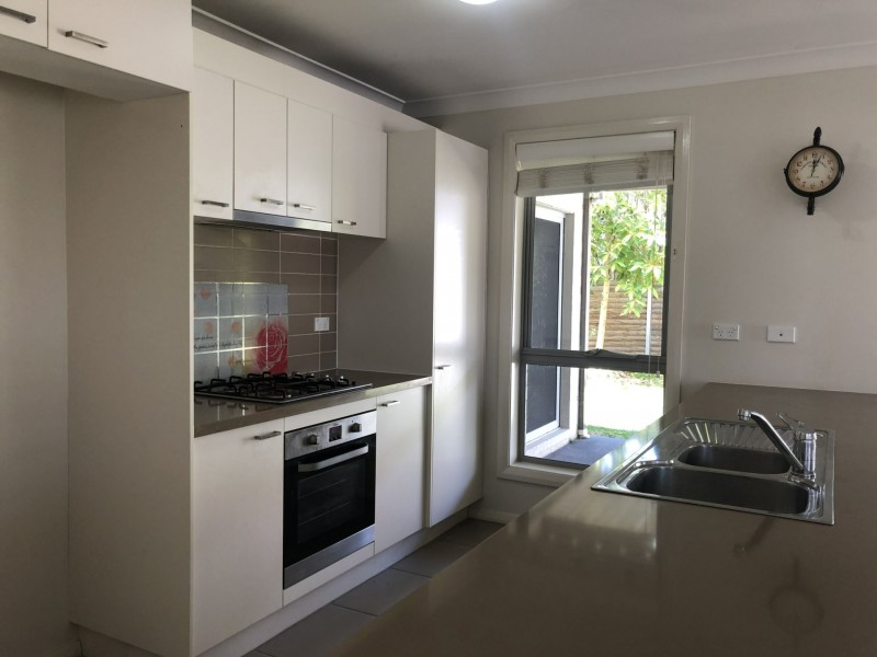 31 Northampton Drive, Glenfield NSW 2167