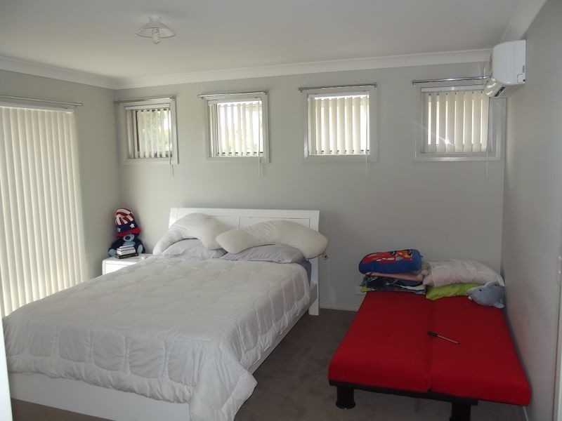 99 Atlantic Bvd, Glenfield NSW 2167