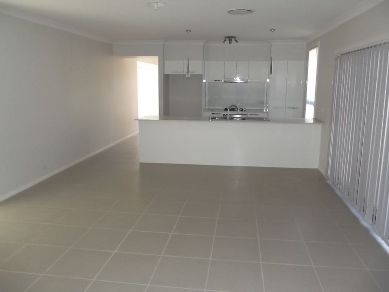 48 Sovereign Cct, Glenfield NSW 2167