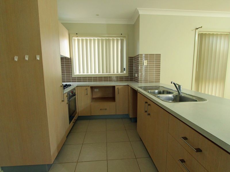 1 Northampton Drive, Glenfield NSW 2167