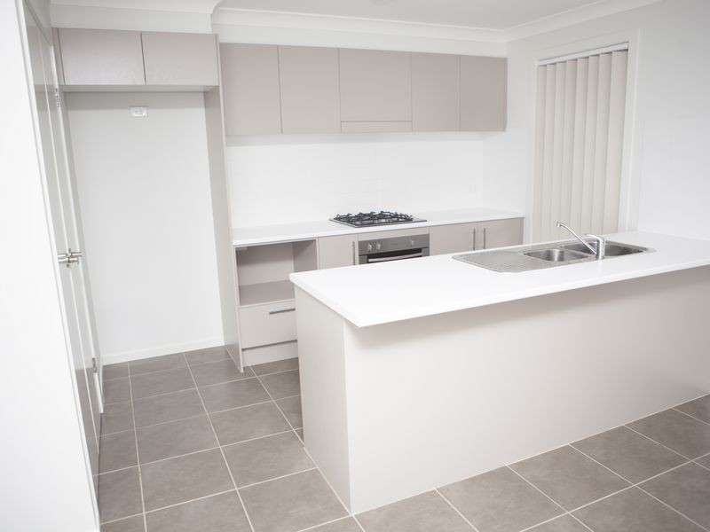 13 Callinan Cres, Denham Court NSW 2565