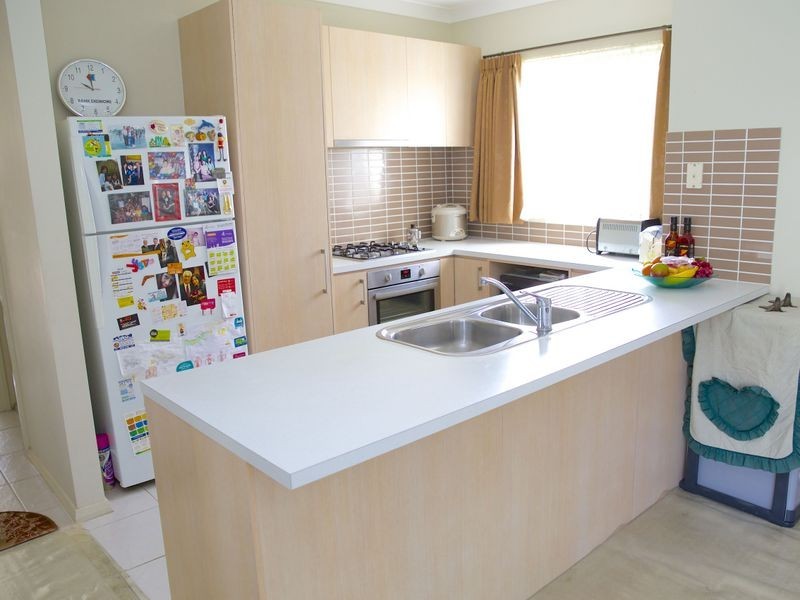 1 Northampton Drive, Glenfield NSW 2167