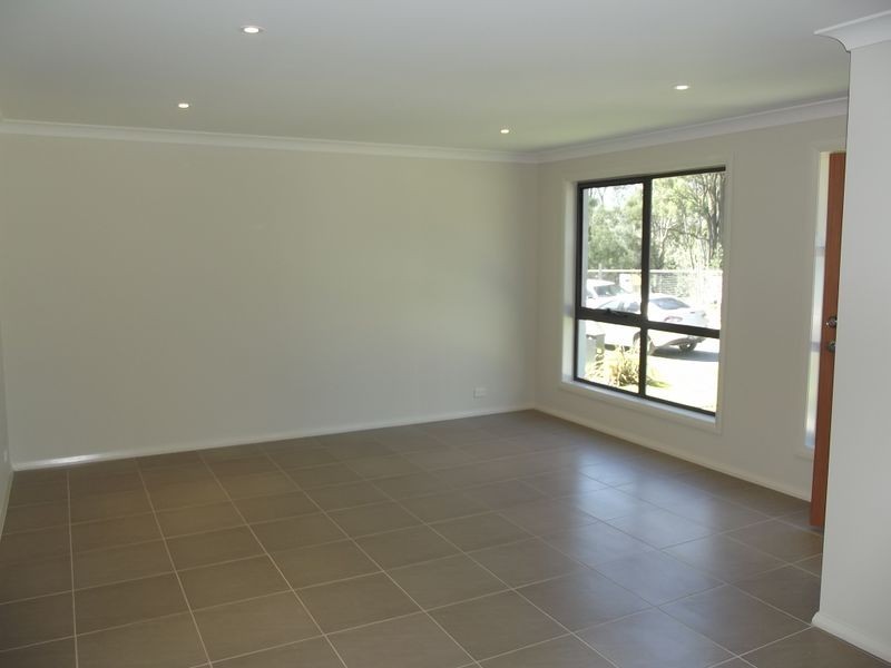 21 Three Bees Drive, Glenfield NSW 2167