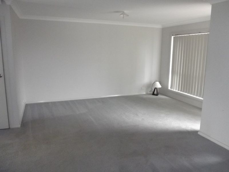 20 Northampton Drive, Glenfield NSW 2167