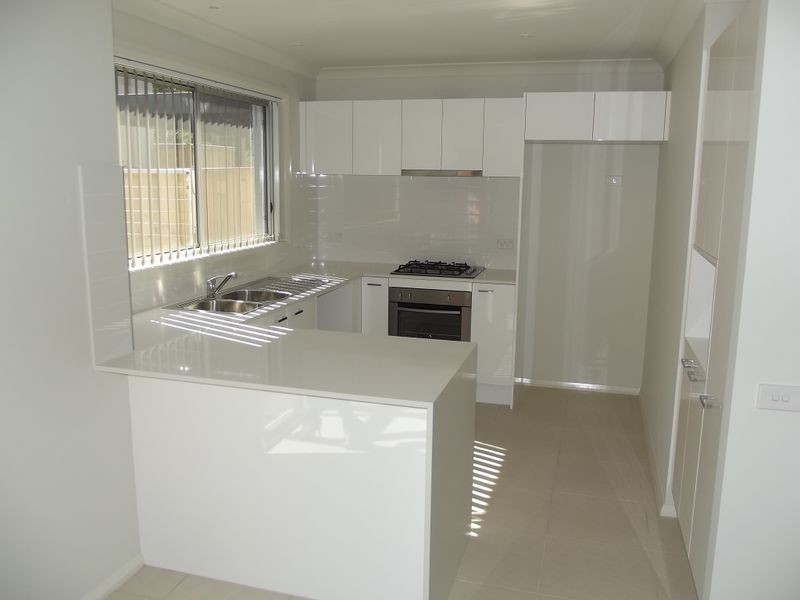 37 Three Bees Drive, Glenfield NSW 2167
