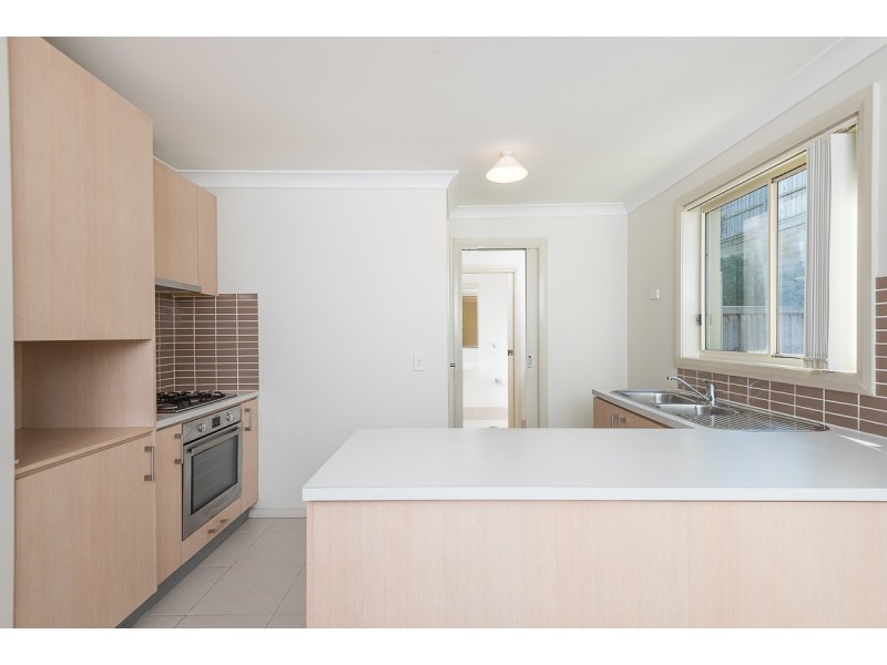 6 Northampton Drive, Glenfield NSW 2167