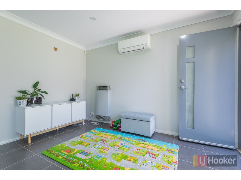 15 Hadlow Avenue, Glenfield NSW 2167