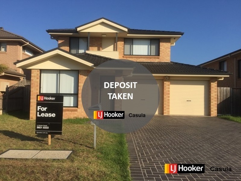 9 Graziers Way, Carnes Hill NSW 2171