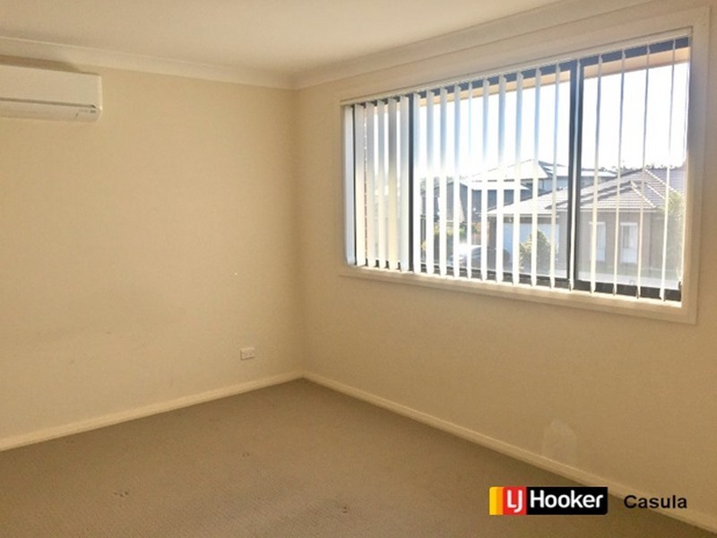 9 Graziers Way, Carnes Hill NSW 2171