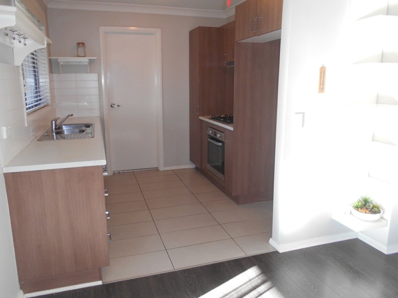 13 Grenada Road, Glenfield NSW 2167