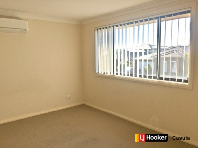 9 Graziers Way, Carnes Hill NSW 2171