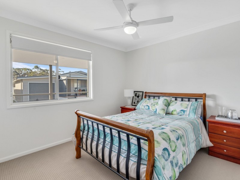 320/25 Mulloway Drive, Chain Valley Bay NSW 2259