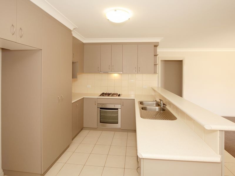 21 Womboin Crescent, Glenfield Park NSW 2650