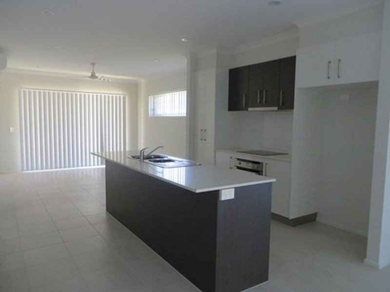 8 BARAMBAH PARADE, Boyne Island QLD 4680