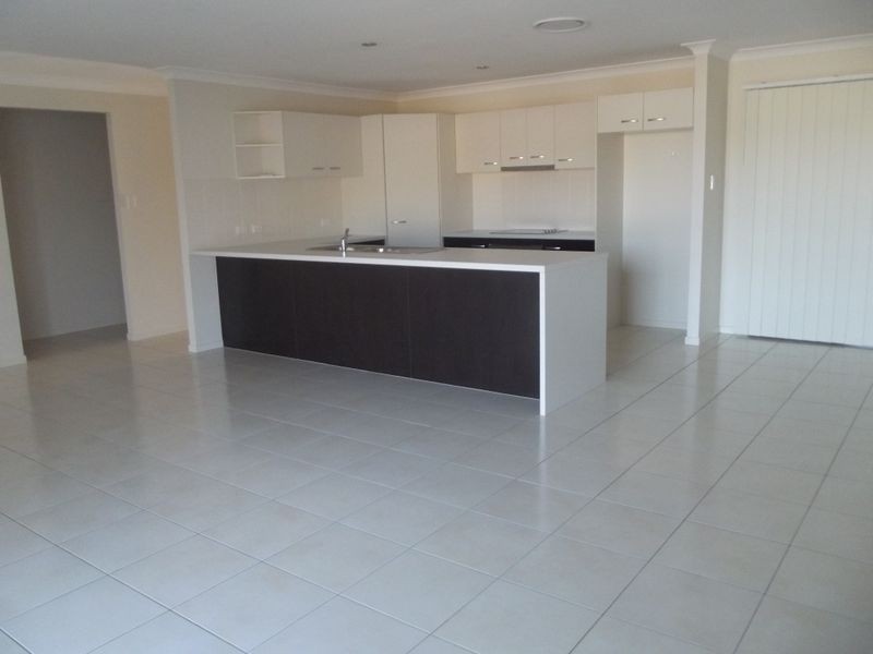 18 WOODWARD AVENUE, Calliope QLD 4680