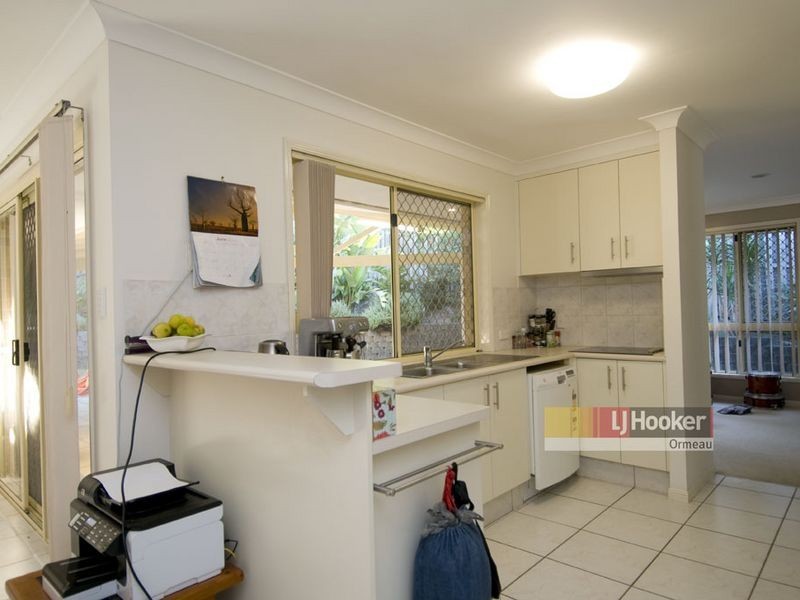 8 Whitecap Cl, Pacific Pines QLD 4211