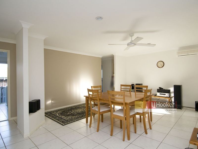 8 Whitecap Cl, Pacific Pines QLD 4211