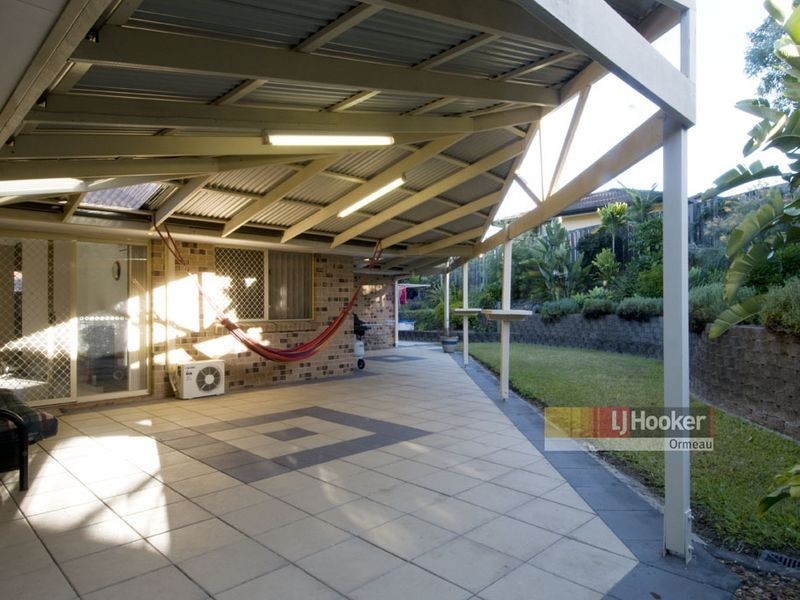 8 Whitecap Cl, Pacific Pines QLD 4211