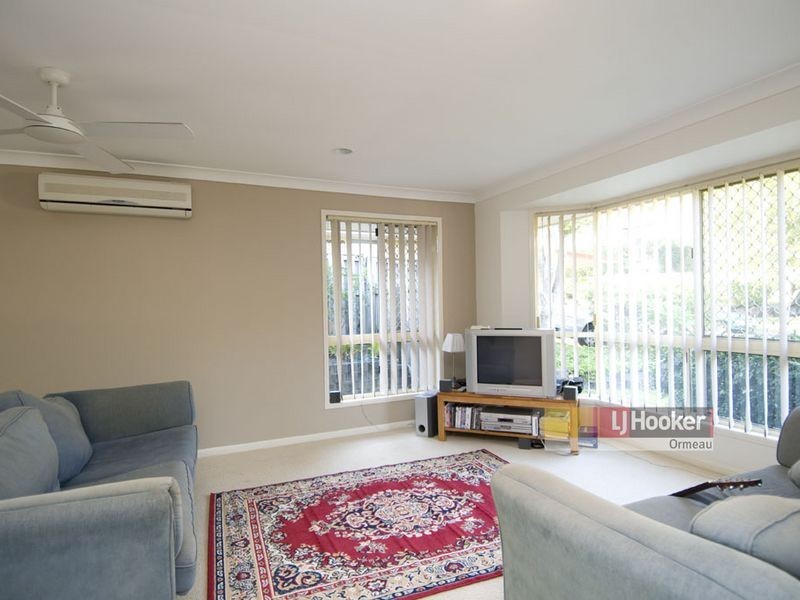 8 Whitecap Cl, Pacific Pines QLD 4211