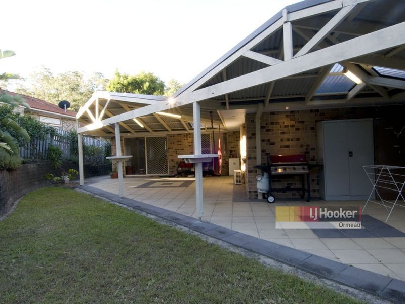 8 Whitecap Cl, Pacific Pines QLD 4211