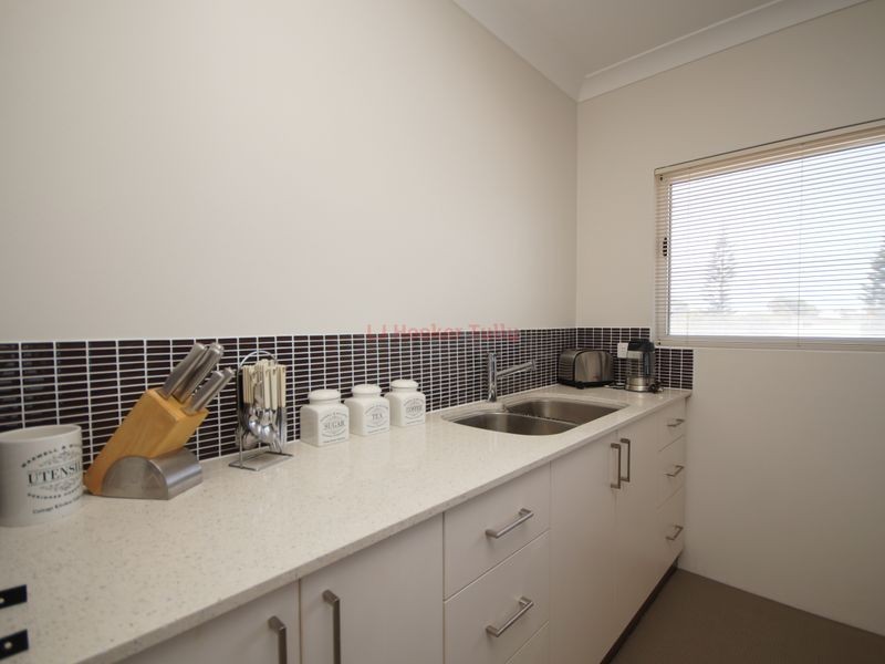 12 Taylor Street, Tully Heads QLD 4854