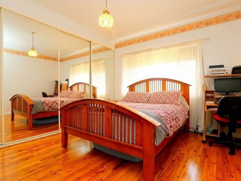 215 Henry Lawson Drive, Georges Hall NSW 2198