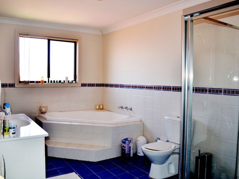 1B San Cristobal Drive, Green Valley NSW 2168