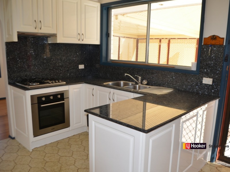 13 Warrina Rd, Bradbury NSW 2560