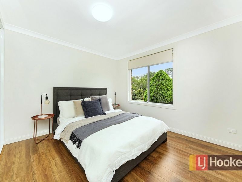9 Correa Place, Macquarie Fields NSW 2564