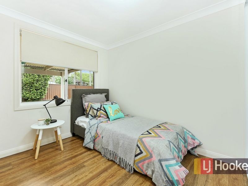 9 Correa Place, Macquarie Fields NSW 2564