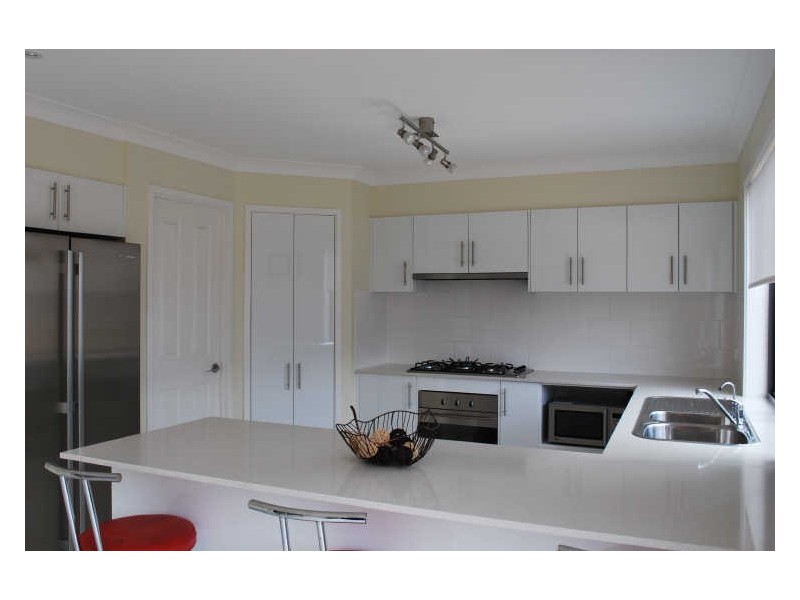 8 Norman Clark Crescent, Horsley NSW 2530