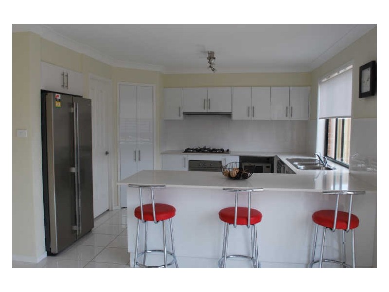 8 Norman Clark Crescent, Horsley NSW 2530