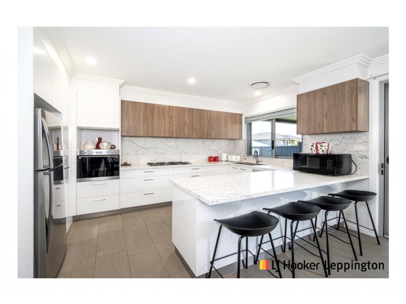 84 & 84a Maidenhair Avenue, Denham Court NSW 2565