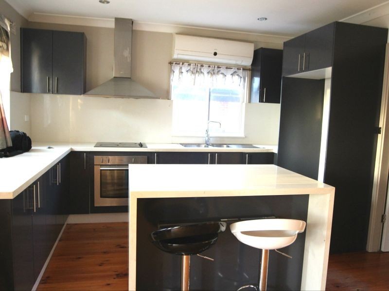 8 Paper Bark Place, Macquarie Fields NSW 2564