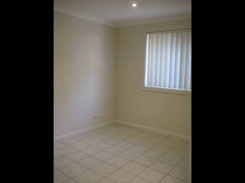 4/13-15 Atchison Road, Macquarie Fields NSW 2564