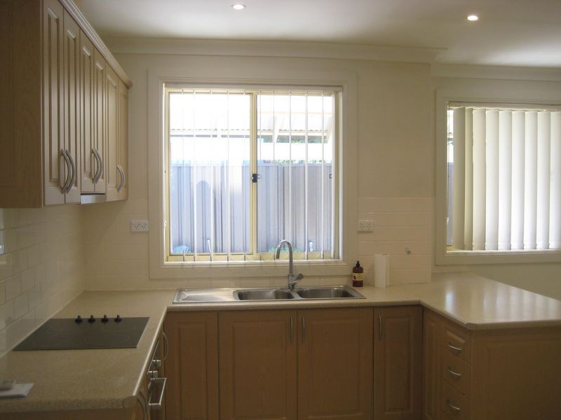 4/13-15 Atchison Road, Macquarie Fields NSW 2564
