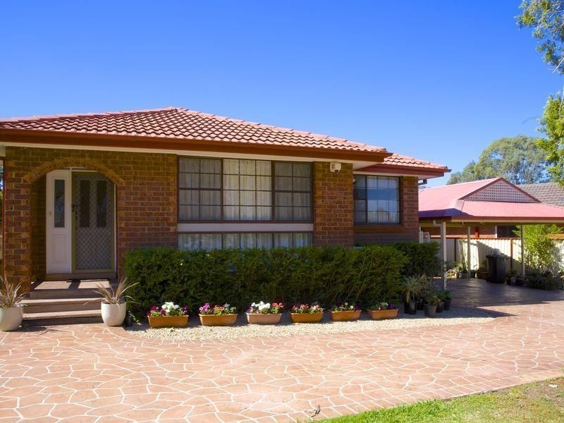 20 Groundsel Ave, Macquarie Fields NSW 2564