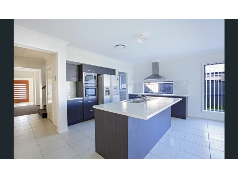 15 Pioneer Drive, Carnes Hill NSW 2171
