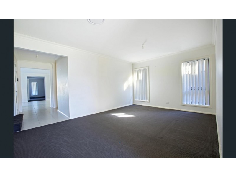 15 Pioneer Drive, Carnes Hill NSW 2171