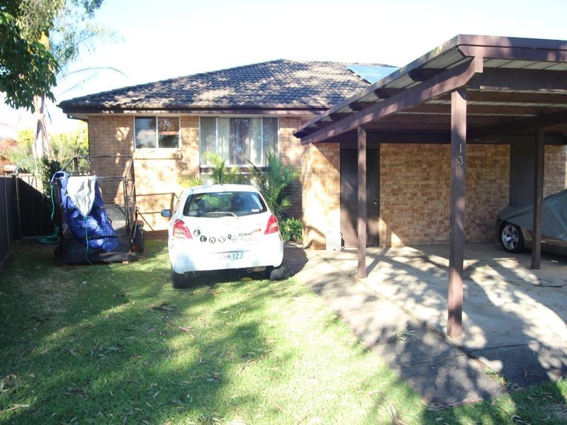 13 Groundsel Avenue, Macquarie Fields NSW 2564