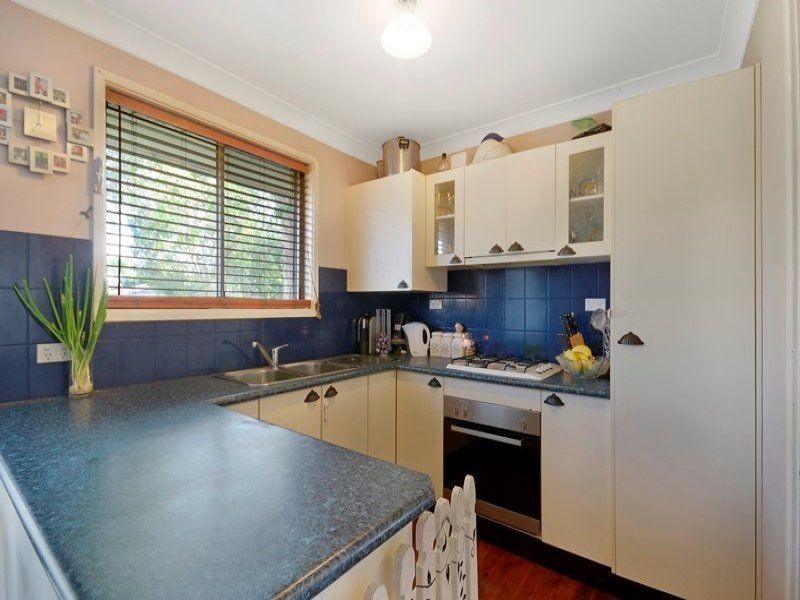 13 Groundsel Avenue, Macquarie Fields NSW 2564
