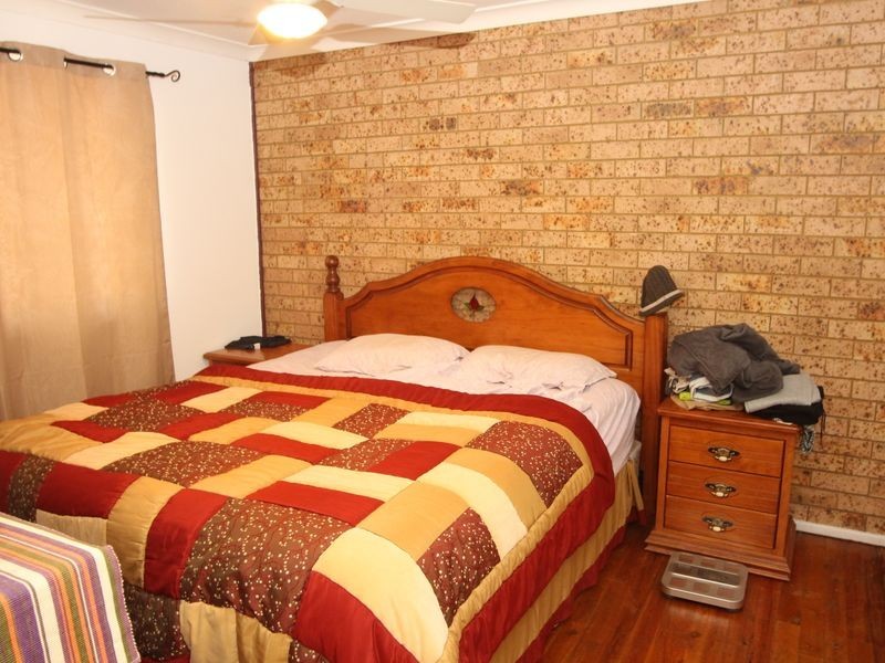 13 Groundsel Avenue, Macquarie Fields NSW 2564