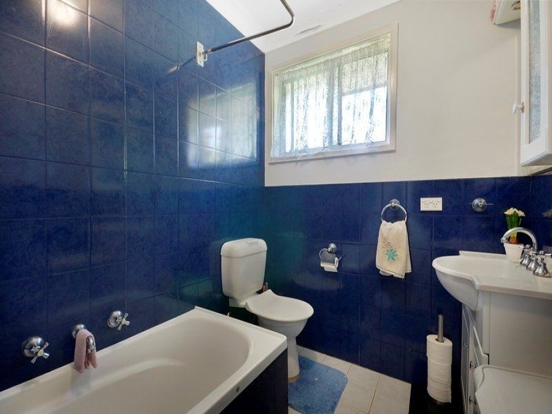 13 Groundsel Avenue, Macquarie Fields NSW 2564