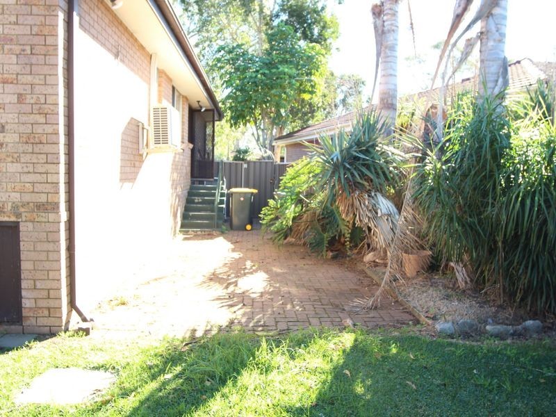 13 Groundsel Avenue, Macquarie Fields NSW 2564