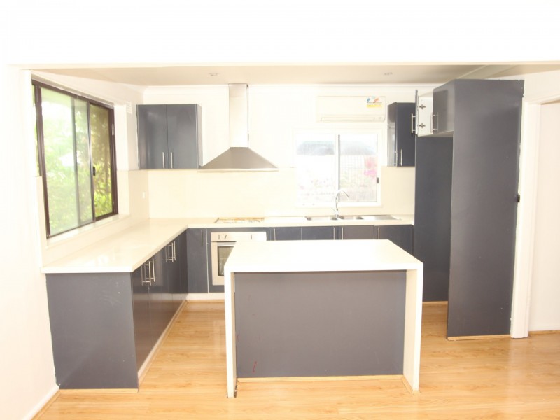 8 Paper Bark Place, Macquarie Fields NSW 2564