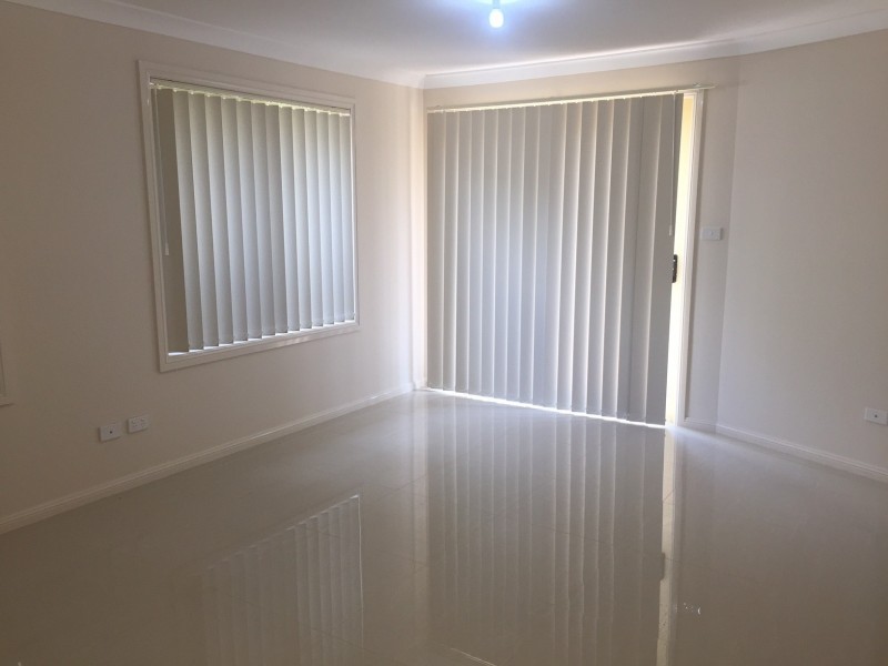 51 Fuchsia Crescent, Macquarie Fields NSW 2564